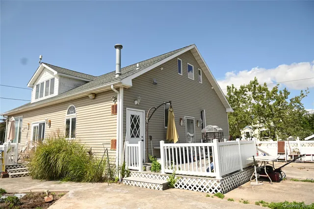a front view of a house with a porch