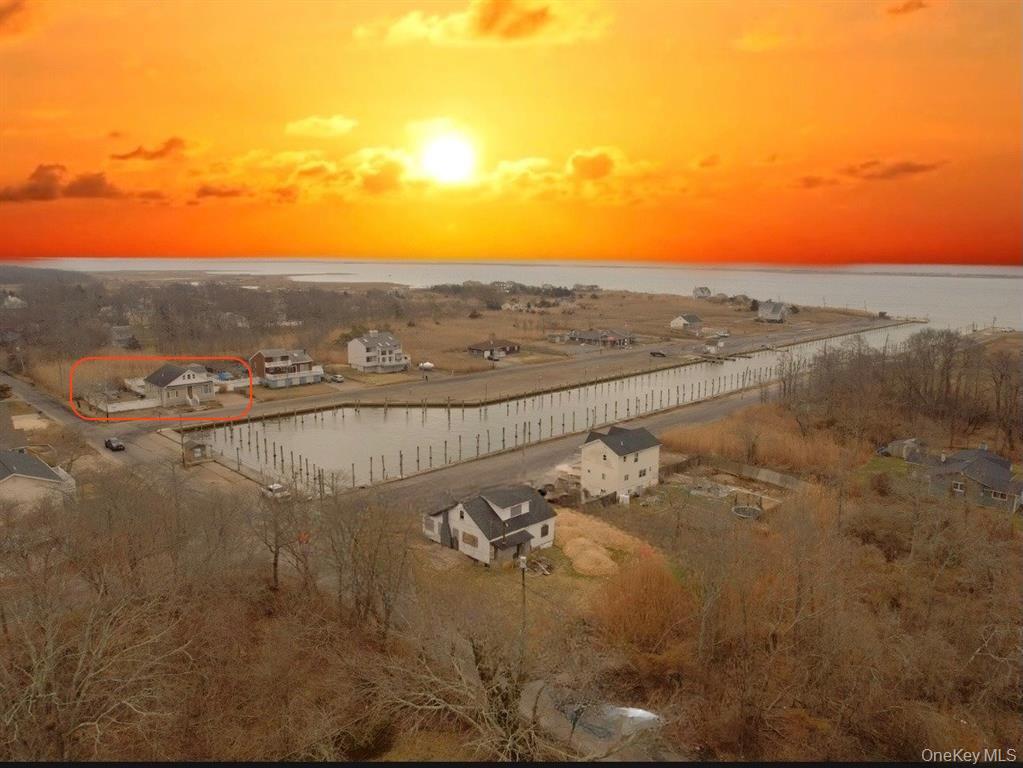 115 Riviera Drive Mastic Beach, NY 11951 - Photo 27 of 27 a view of an ocean and mountain