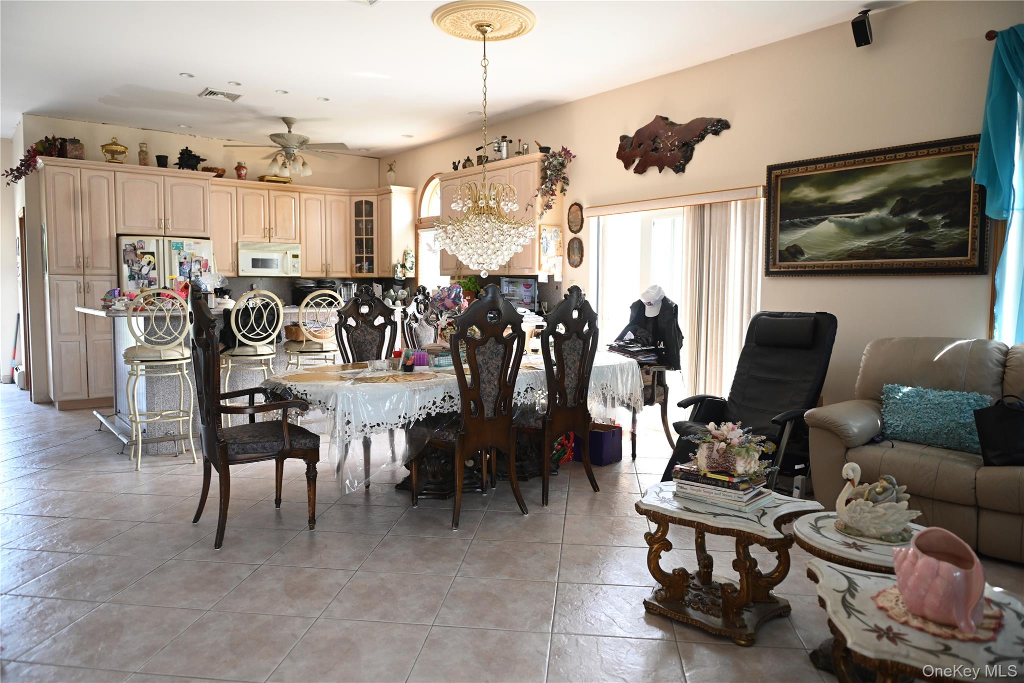 115 Riviera Drive Mastic Beach, NY 11951 - Photo 5 of 27 a living room with furniture and a flat screen tv
