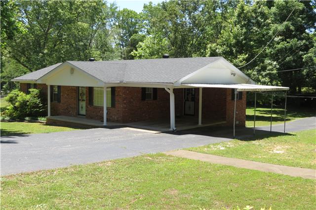 57 Butler Road Parsons, TN 38363 - Photo 2 of 19 Front View of Home from street, showing paved drive