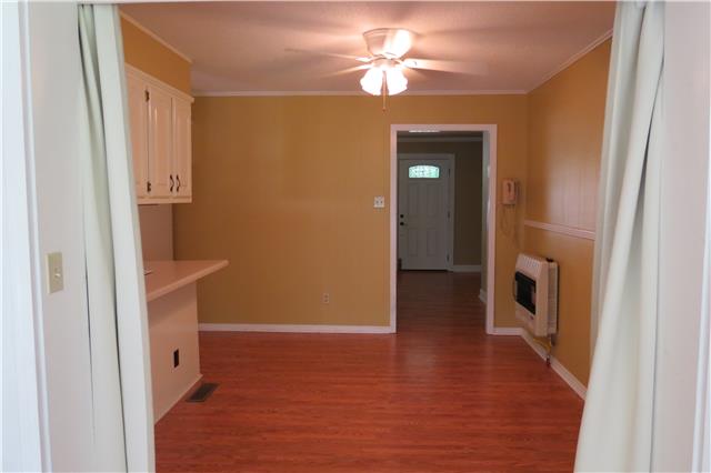 57 Butler Road Parsons, TN 38363 - Photo 6 of 19 Eat-in kitchen area opened to Florida Room