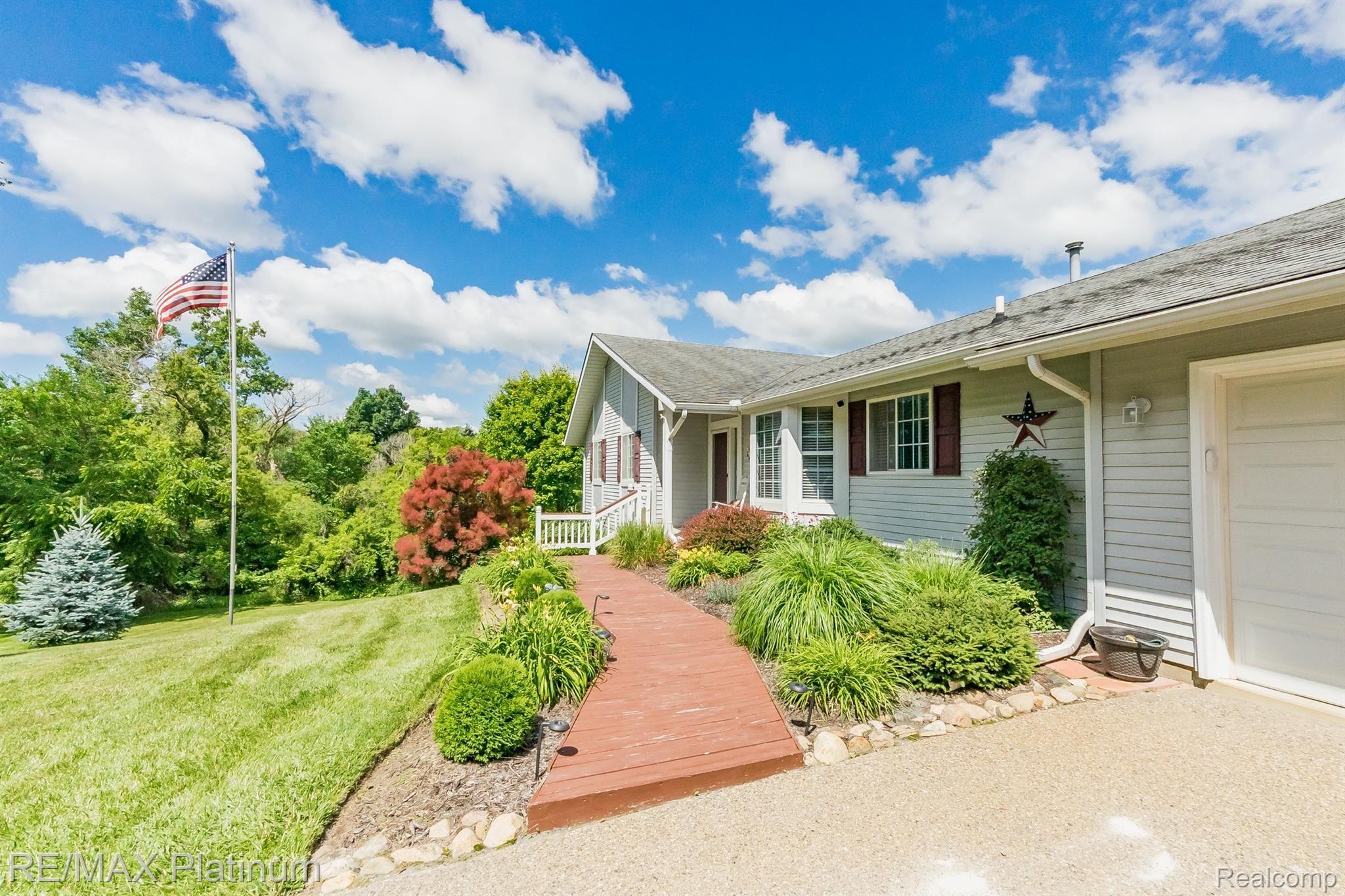 3738 West Schafer Road Pinckney, MI 48169 - Photo 23 of 75 Beautifully landscaped.