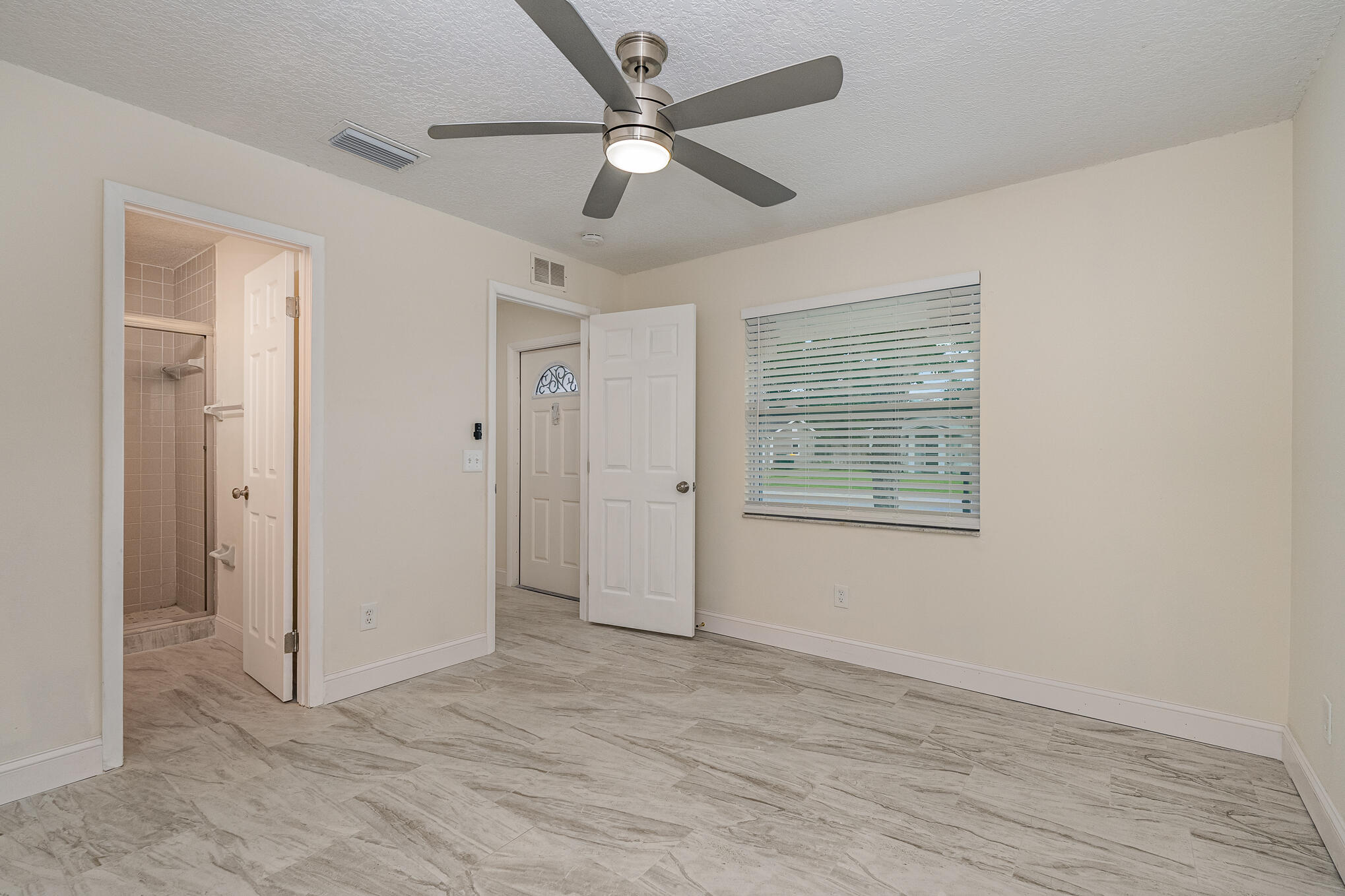 2896 Lancaster Road Melbourne, FL 32935 - Photo 16 of 25 a view of an empty room with a window
