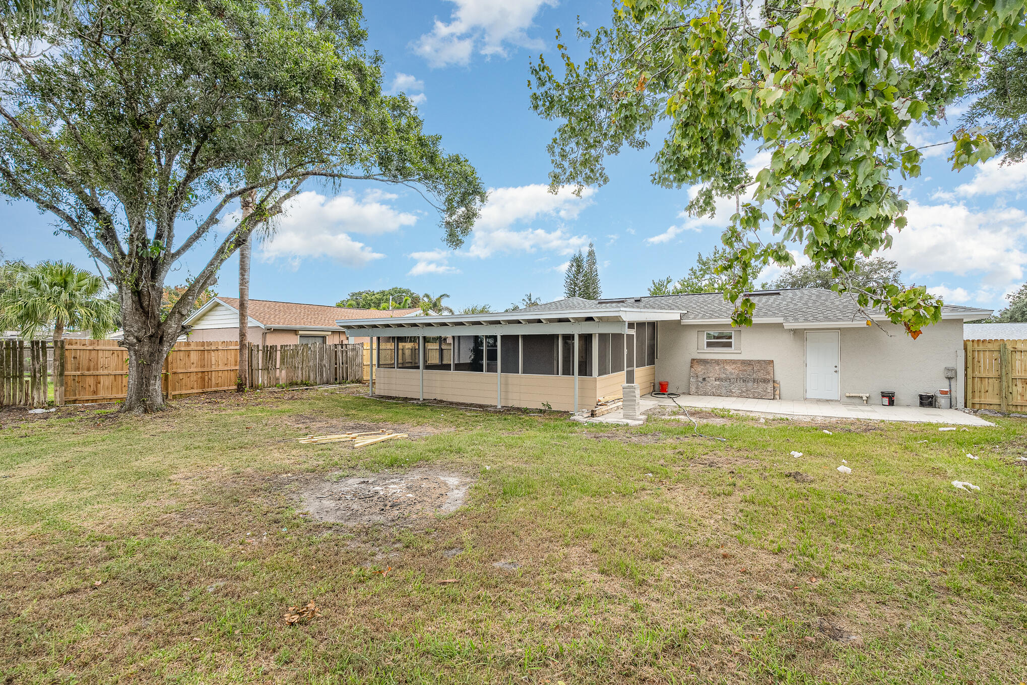 2896 Lancaster Road Melbourne, FL 32935 - Photo 25 of 25 a view of a house with backyard and sitting area