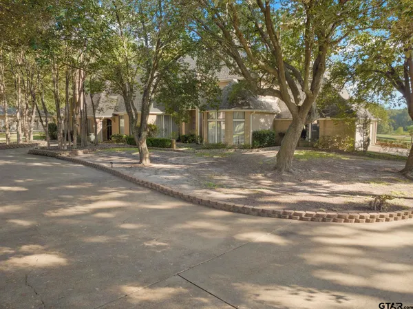 a backyard of a house with trees