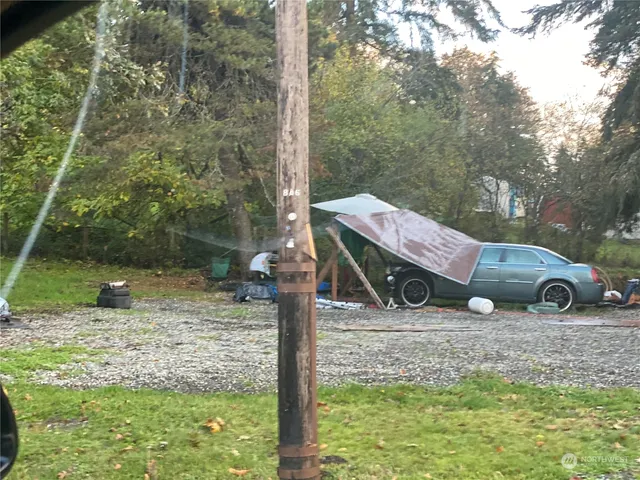 a backyard of a house with lots of green space