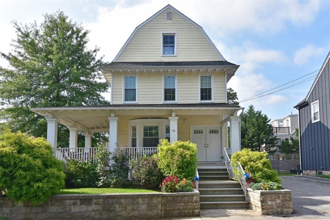 70 2nd Street, Unit 2 Pelham, NY 10803 - Photo 1 of 1 front view of a house with potted plants