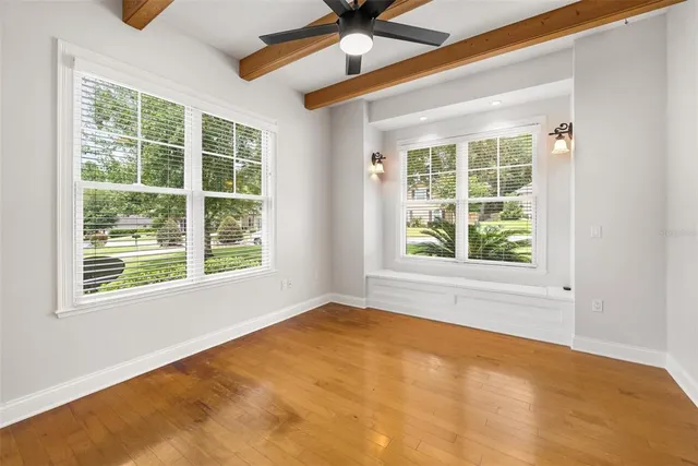 a view of an empty room with a window