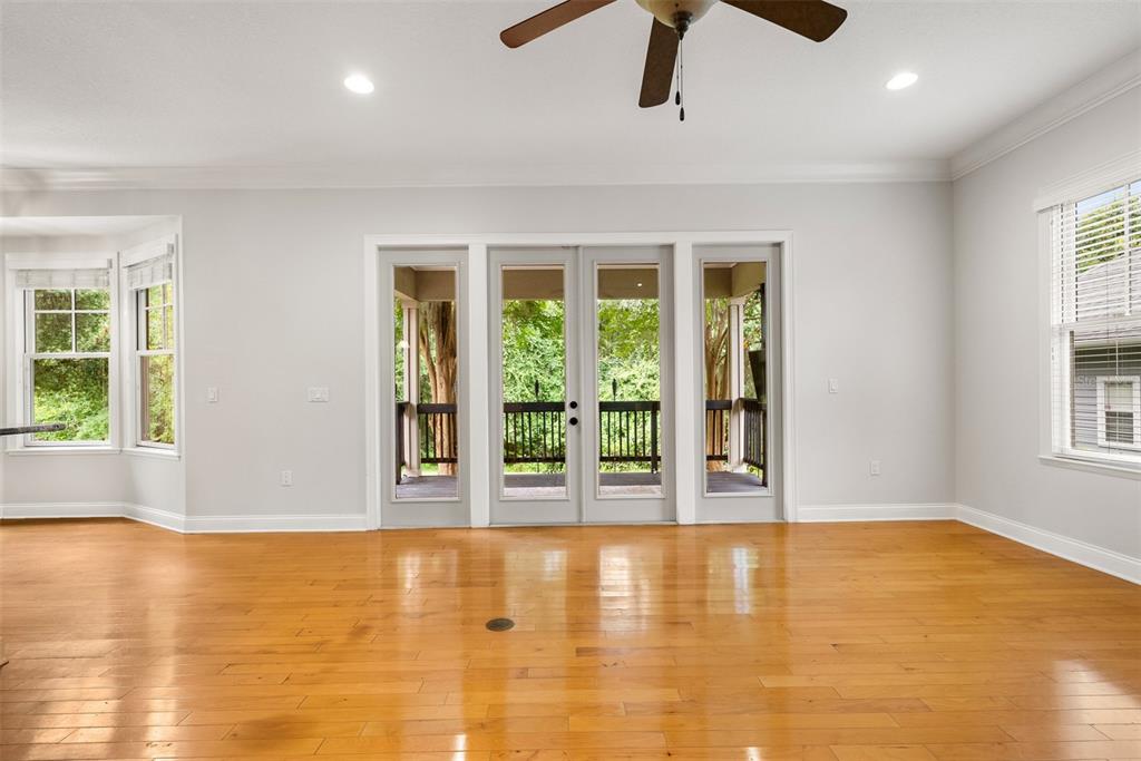 11067 Northwest 18th Road Gainesville, FL 32606 - Photo 16 of 58 a view of room with window and ceiling fan