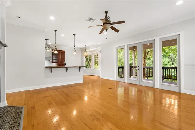 a kitchen with stainless steel appliances granite countertop a stove and a sink