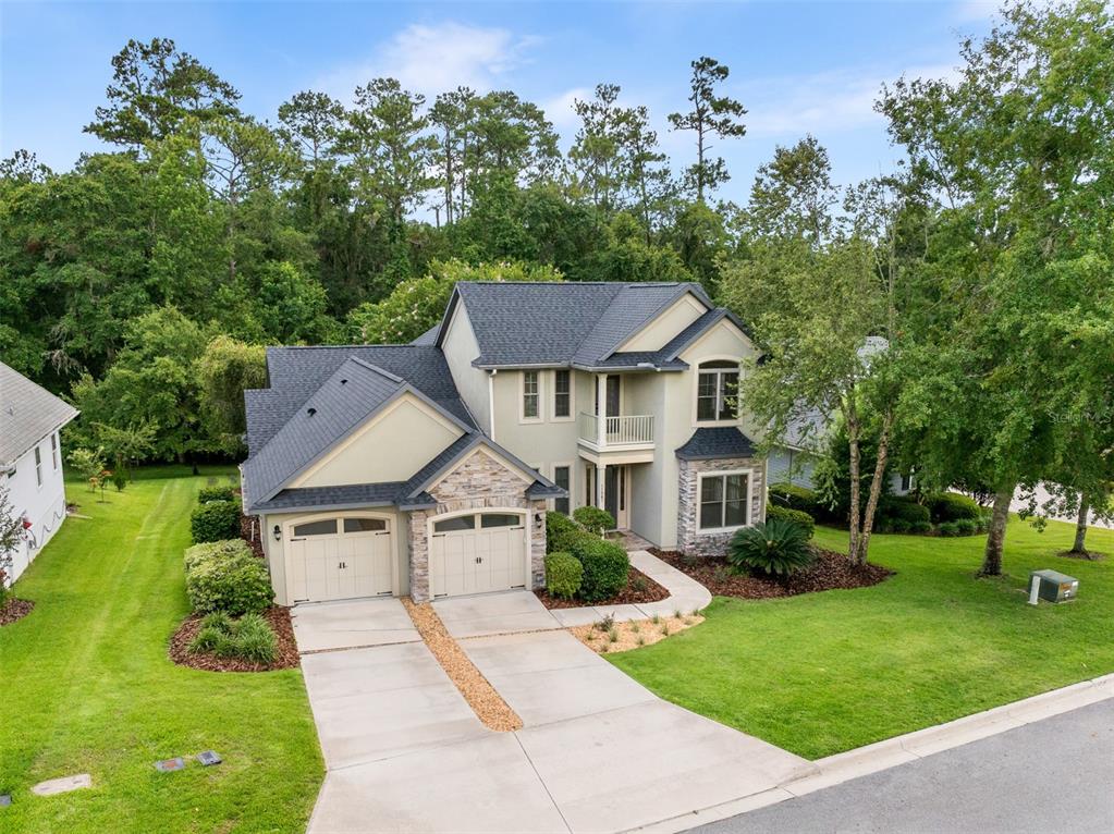 11067 Northwest 18th Road Gainesville, FL 32606 - Photo 3 of 58 a aerial view of a house with a yard