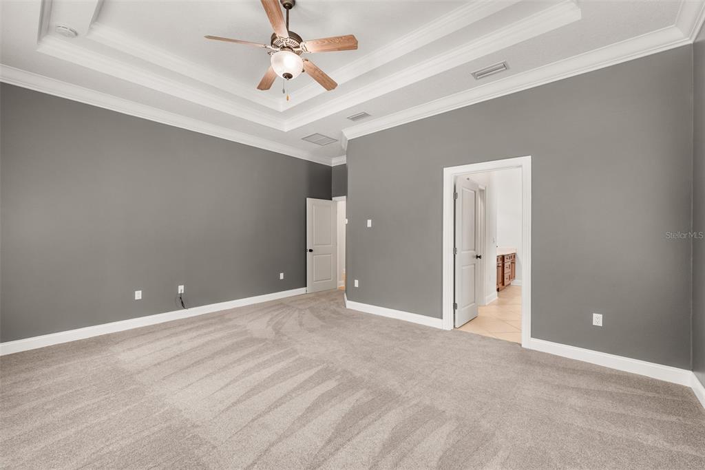11067 Northwest 18th Road Gainesville, FL 32606 - Photo 31 of 58 a view of an empty room and a ceiling fan