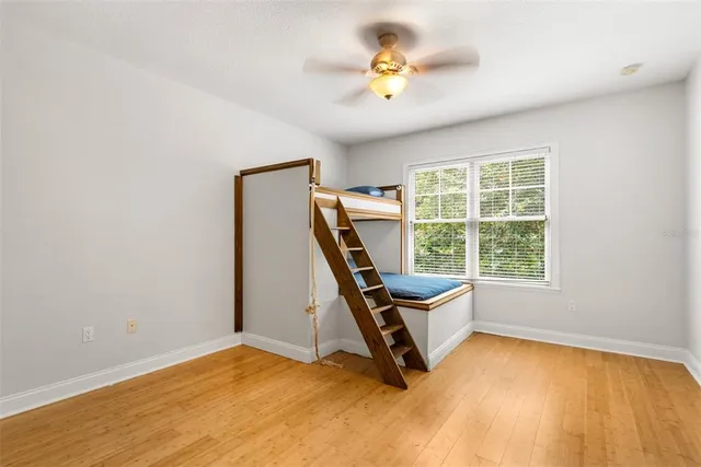 an aerial view of a house with yard swimming pool and outdoor seating