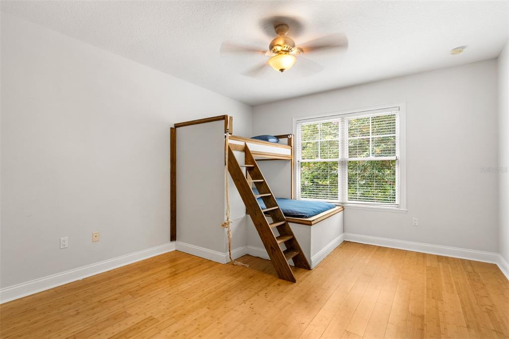 11067 Northwest 18th Road Gainesville, FL 32606 - Photo 48 of 58 a view of a room with gym equipment and a window