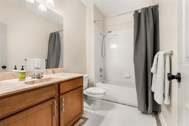 an aerial view of a house with a garden