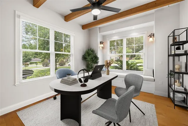 a view of a dining room with furniture window and outside view