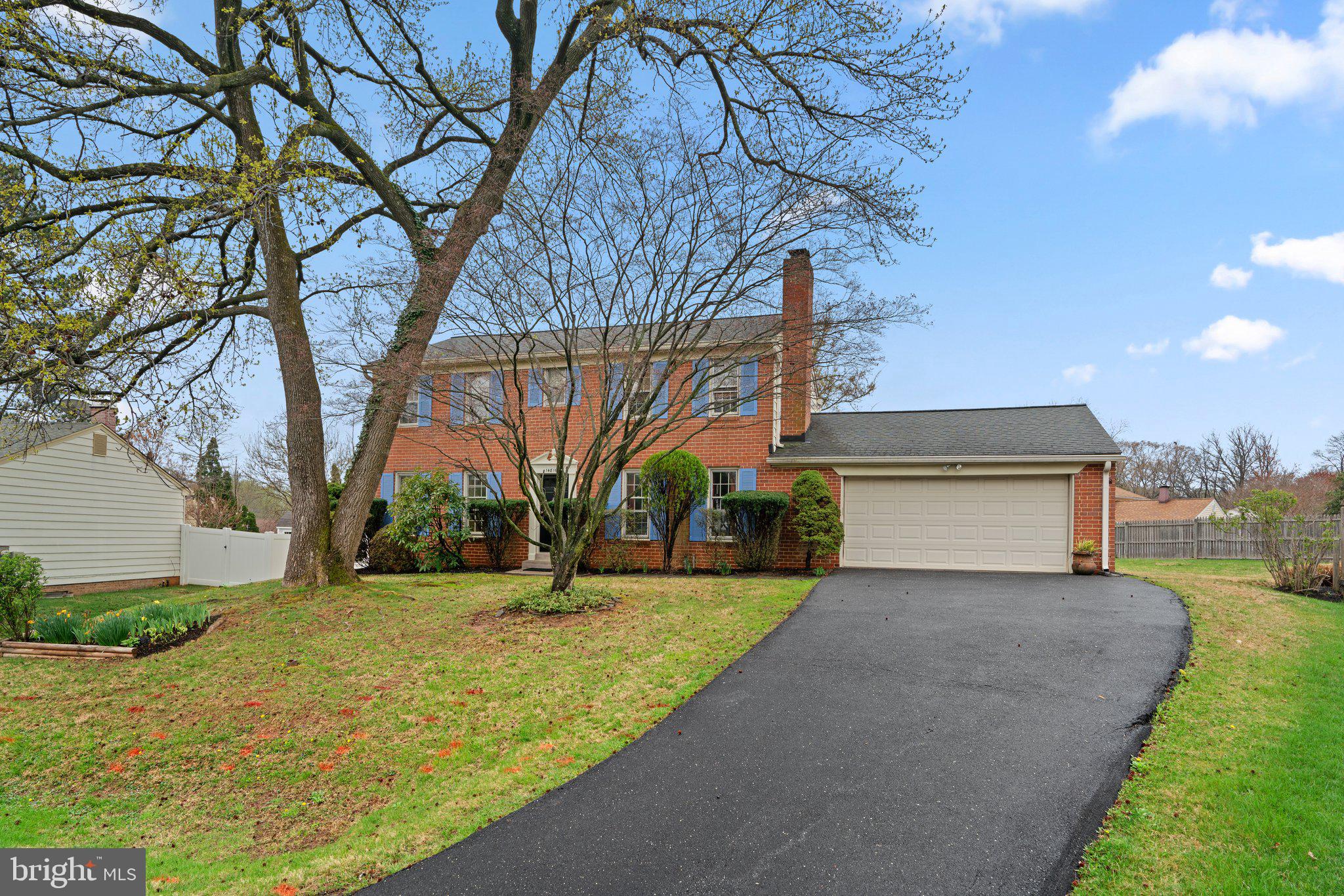 14816 Mistletoe Court Silver Spring, MD 20905 - Photo 1 of 44 a view of a house with a yard and large tree