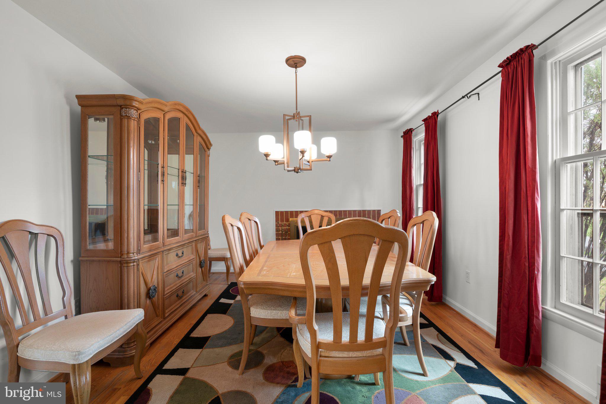 14816 Mistletoe Court Silver Spring, MD 20905 - Photo 14 of 44 a view of a dining room with furniture window and wooden floor