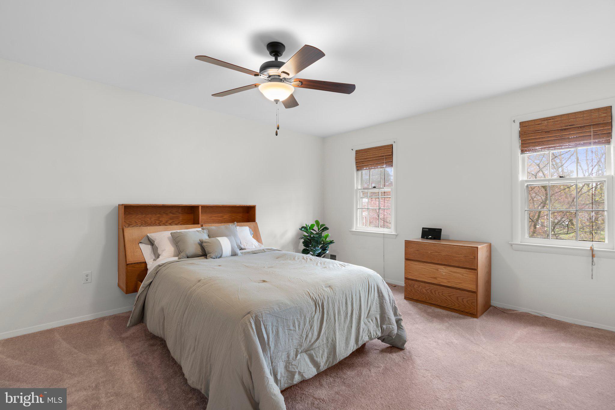 14816 Mistletoe Court Silver Spring, MD 20905 - Photo 24 of 44 a bedroom with a bed and a window
