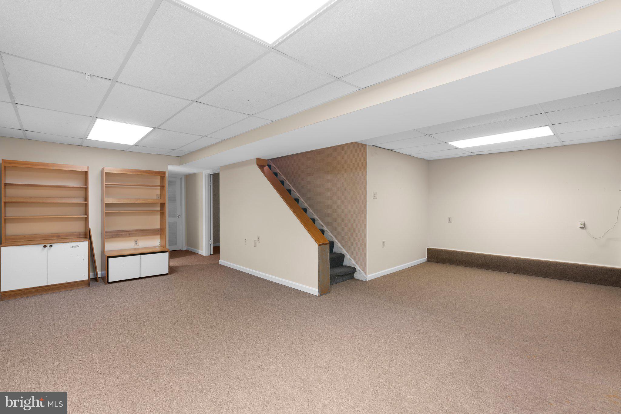 14816 Mistletoe Court Silver Spring, MD 20905 - Photo 33 of 44 a view of an empty room with a staircase