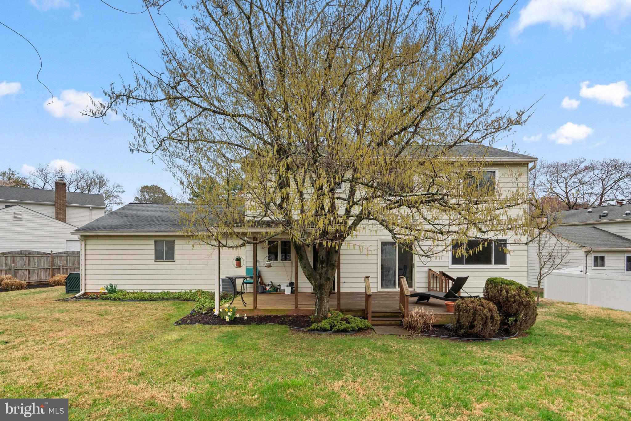 14816 Mistletoe Court Silver Spring, MD 20905 - Photo 42 of 44 a view of a house with a backyard and a tree
