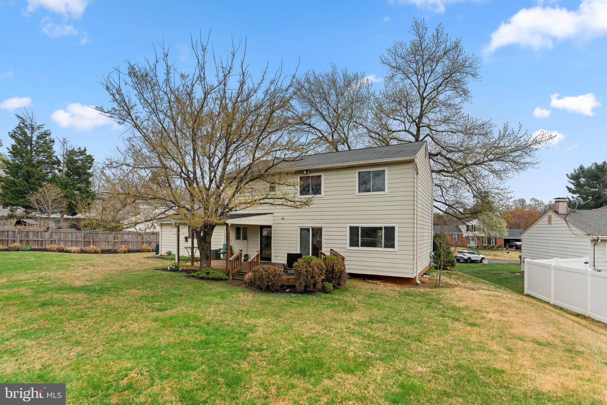 14816 Mistletoe Court Silver Spring, MD 20905 - Photo 43 of 44 a front view of house with yard and trees