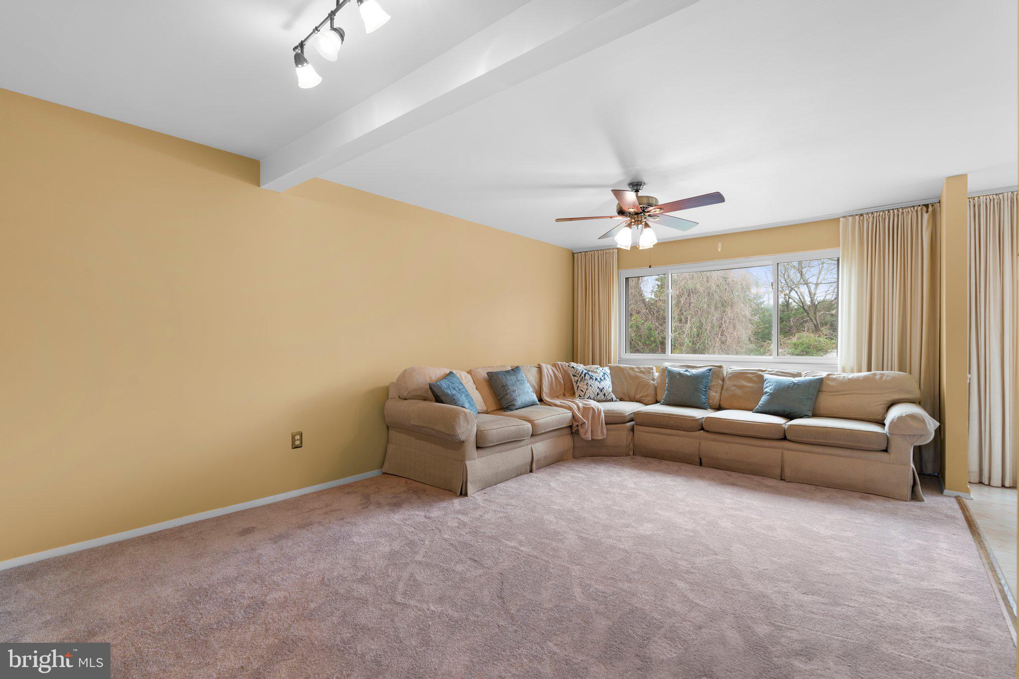14816 Mistletoe Court Silver Spring, MD 20905 - Photo 5 of 44 a living room with furniture and a large window