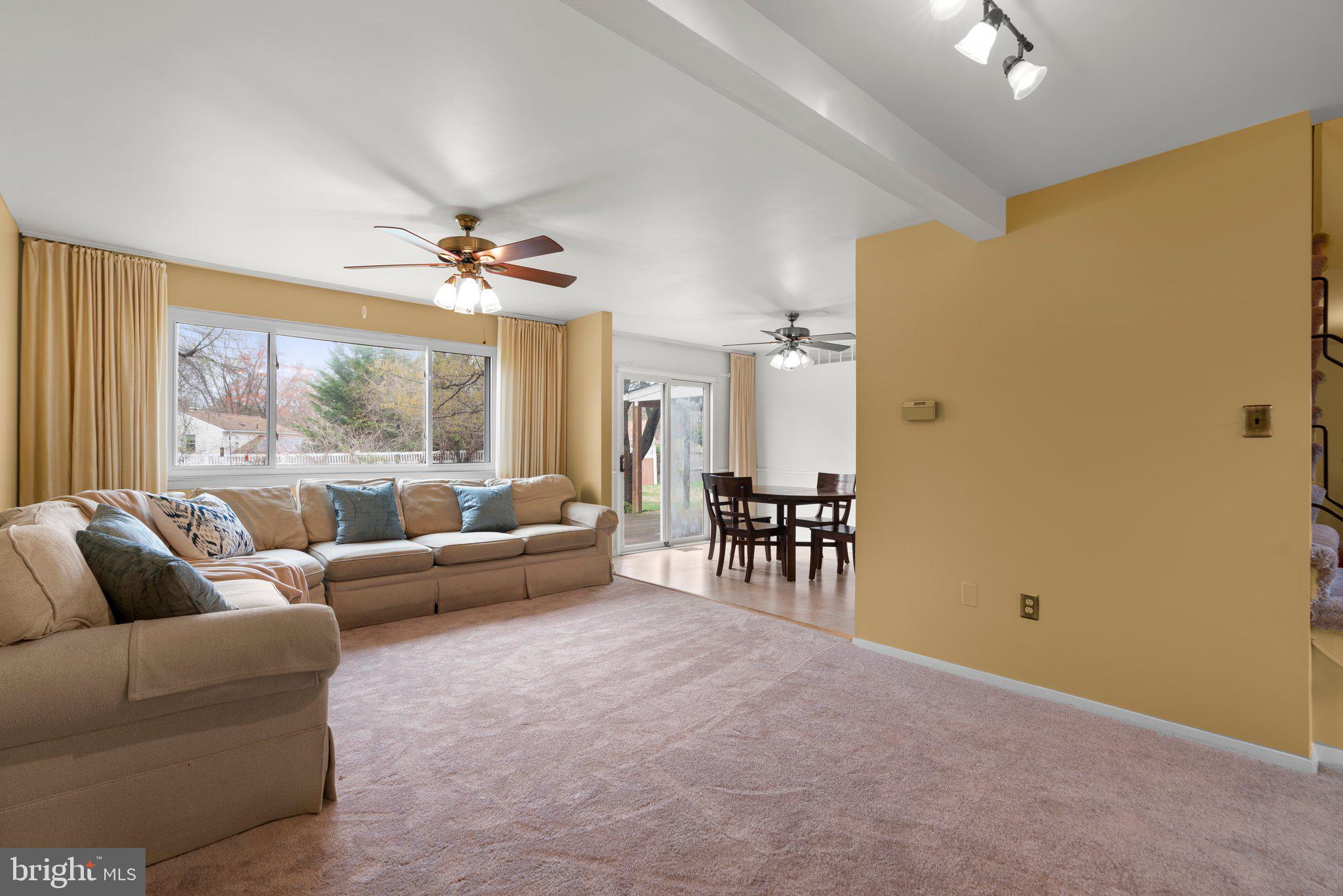 14816 Mistletoe Court Silver Spring, MD 20905 - Photo 6 of 44 a living room with furniture and a large window