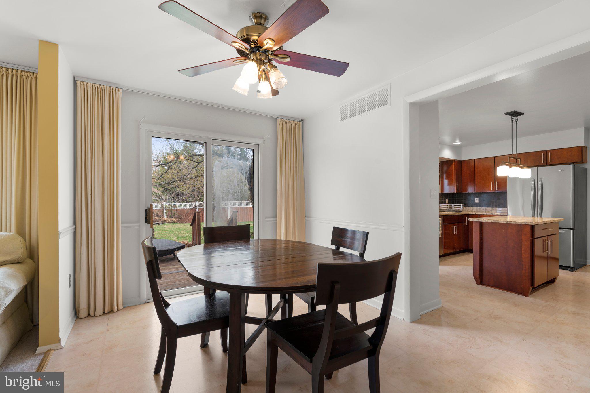 14816 Mistletoe Court Silver Spring, MD 20905 - Photo 8 of 44 a view of a dining room with furniture