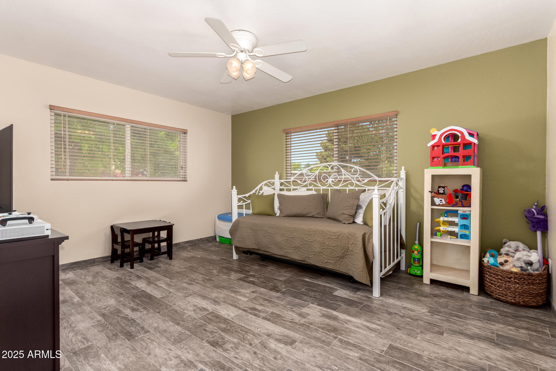 12548 East Cloud Road Chandler, AZ 85249 - Photo 20 of 34 a living room with furniture and a flat screen tv