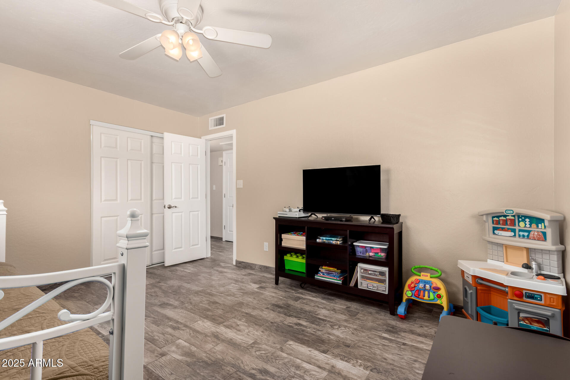12548 East Cloud Road Chandler, AZ 85249 - Photo 21 of 34 a living room with furniture and a flat screen tv