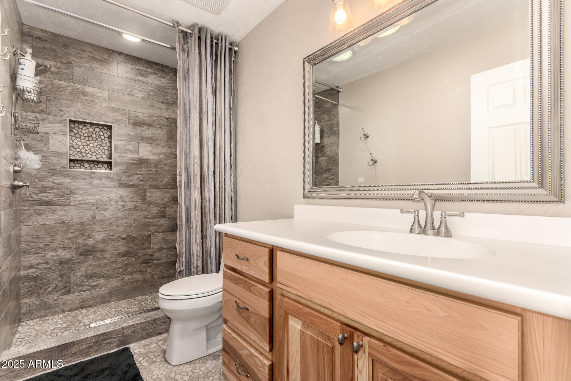 12548 East Cloud Road Chandler, AZ 85249 - Photo 22 of 34 a bathroom with a sink a toilet and shower