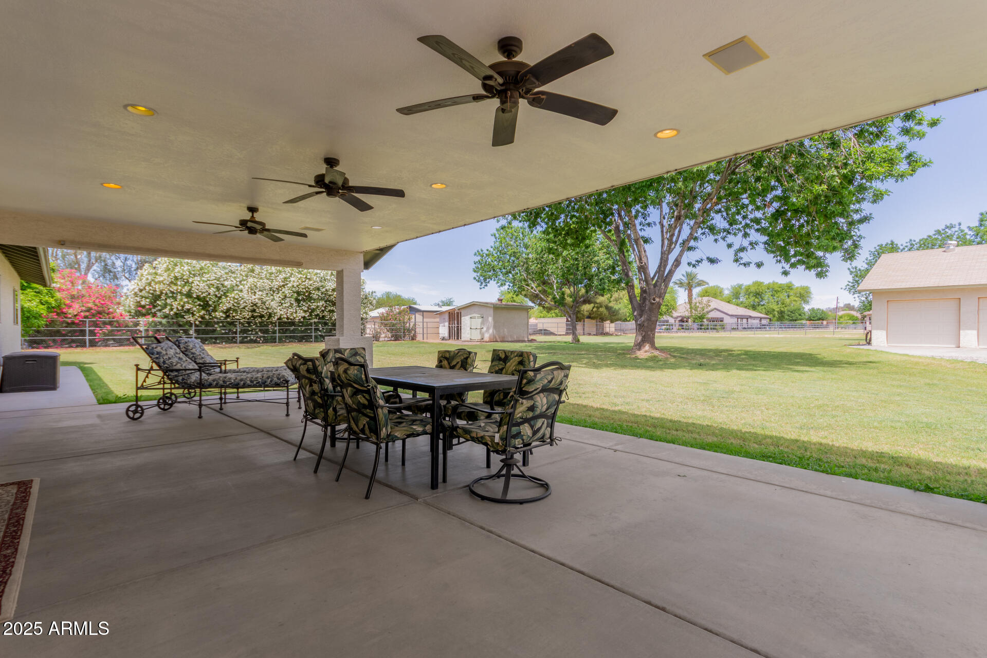 12548 East Cloud Road Chandler, AZ 85249 - Photo 25 of 34 a view of a patio with a table and chairs