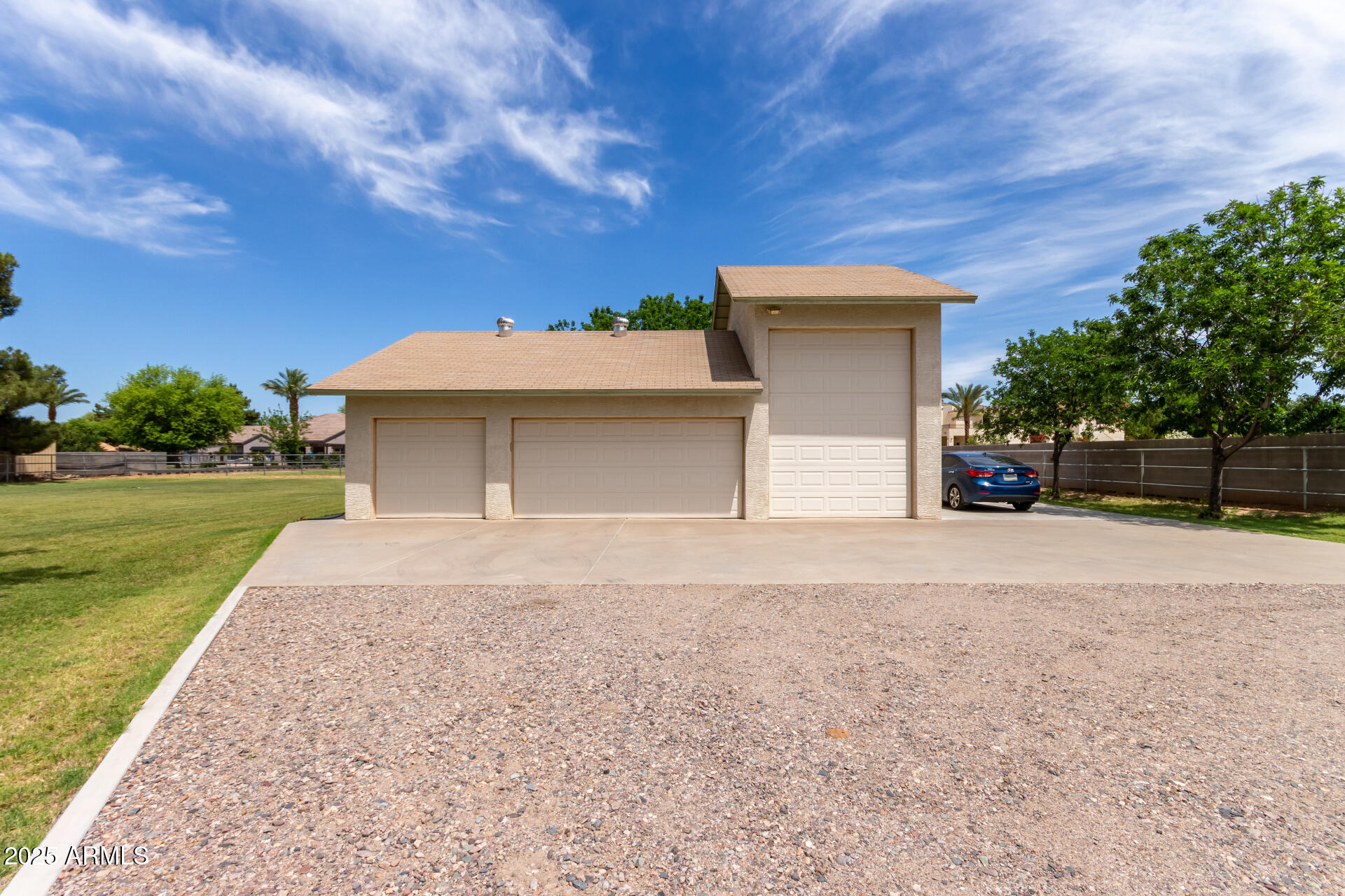 12548 East Cloud Road Chandler, AZ 85249 - Photo 28 of 34 front view of a house with a yard and a garage