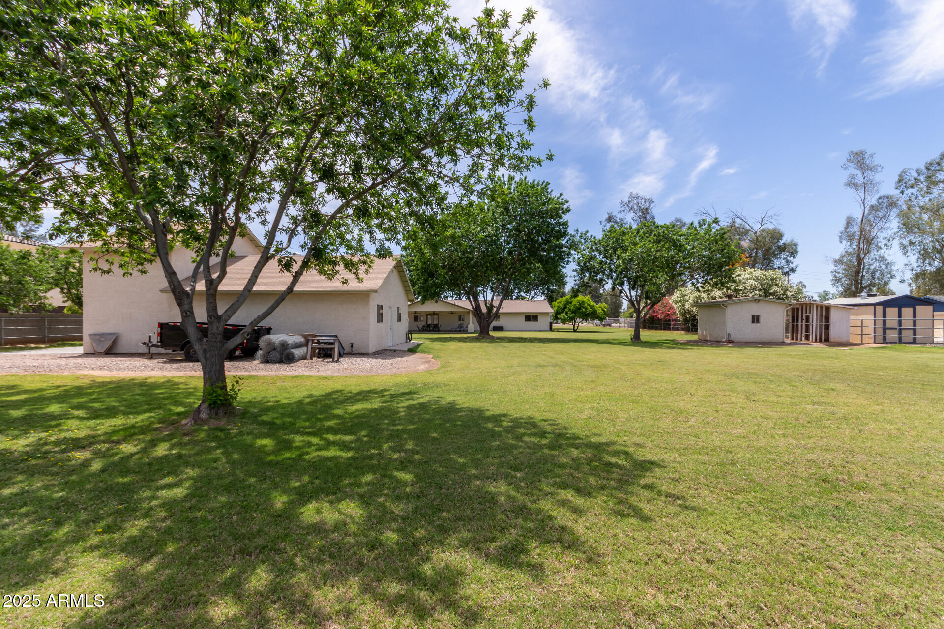 12548 East Cloud Road Chandler, AZ 85249 - Photo 30 of 34 a view of a house with a yard