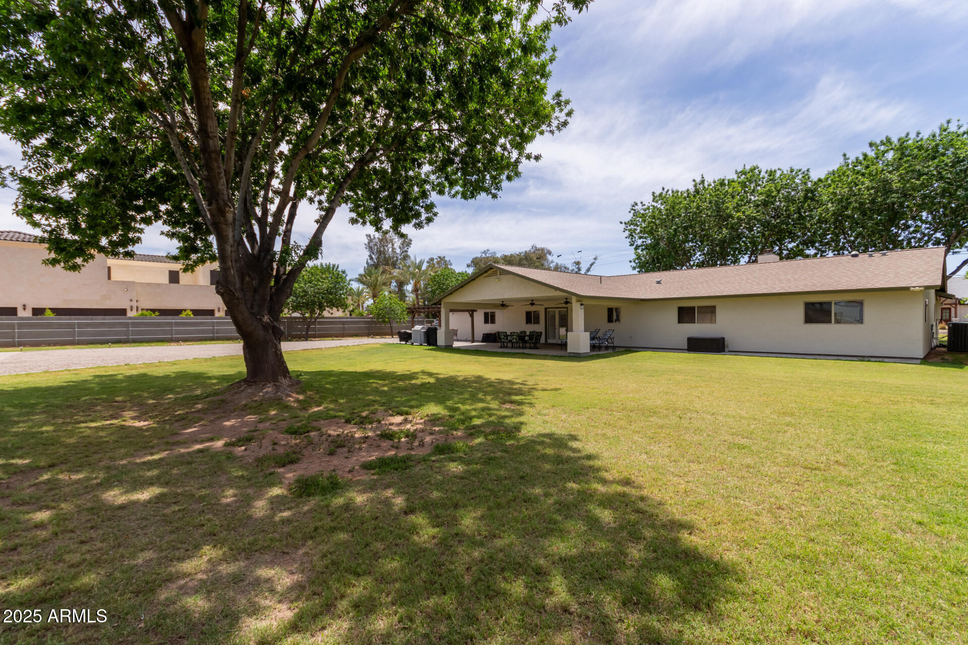 12548 East Cloud Road Chandler, AZ 85249 - Photo 34 of 34 a front view of a house with a yard