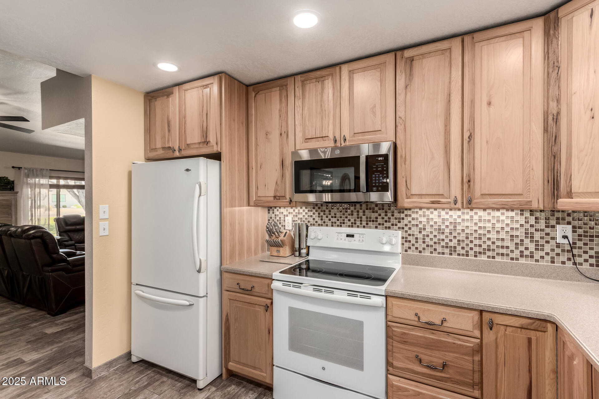 12548 East Cloud Road Chandler, AZ 85249 - Photo 9 of 34 a kitchen with a refrigerator sink and cabinets