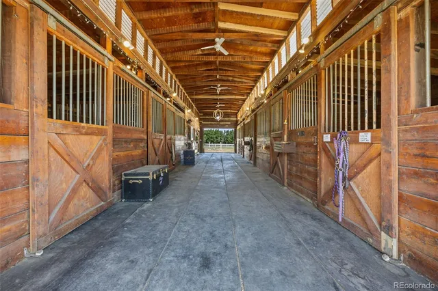a view of an empty room with stairs
