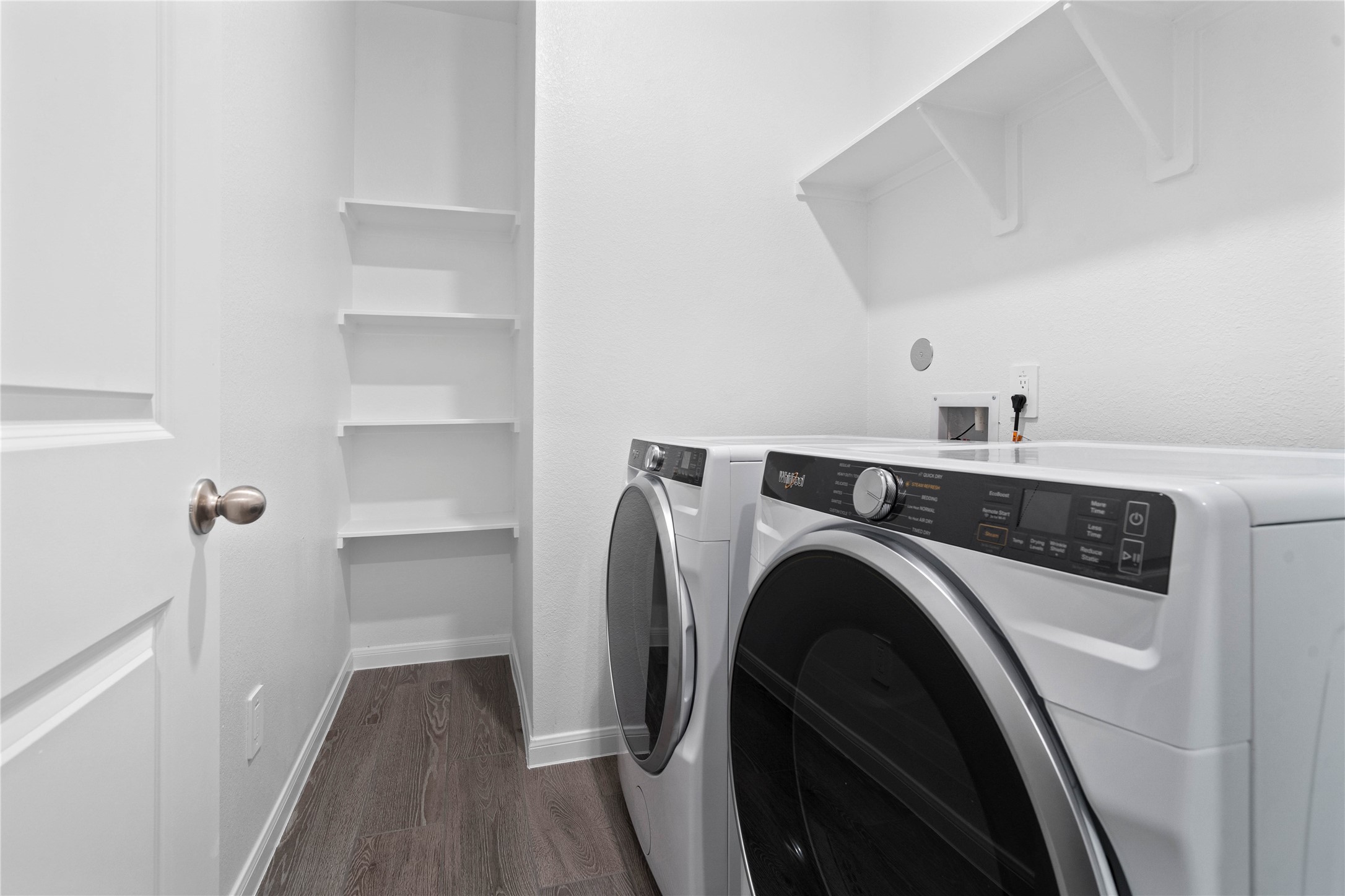 19657 Montgomery Rdg Way Montgomery, TX 77316 - Photo 22 of 49 This dedicated laundry room comes equipped with a washer and dryer set, ready for immediate use.