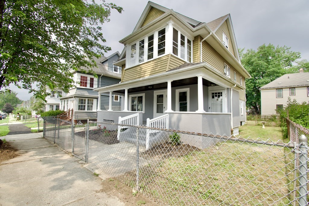 80-82 Silver Street Springfield, MA 01107 - Photo 1 of 31 a front view of a house with a yard and outdoor seating