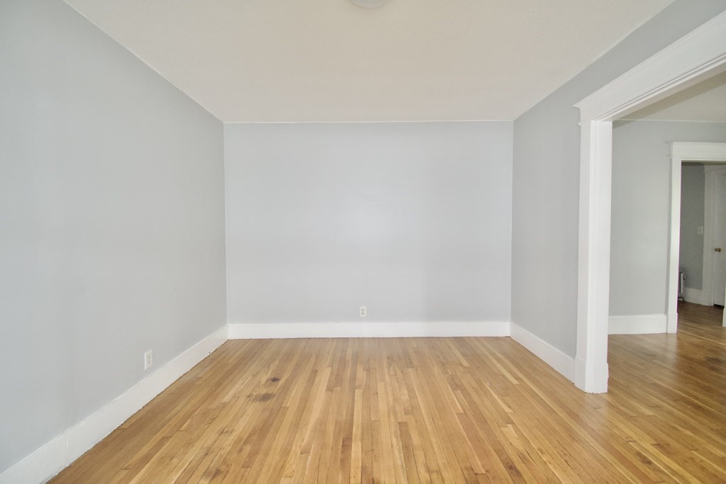 80-82 Silver Street Springfield, MA 01107 - Photo 19 of 31 a view of a room with wooden floor