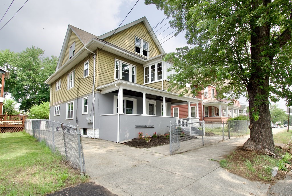80-82 Silver Street Springfield, MA 01107 - Photo 2 of 31 a front view of a house with a yard
