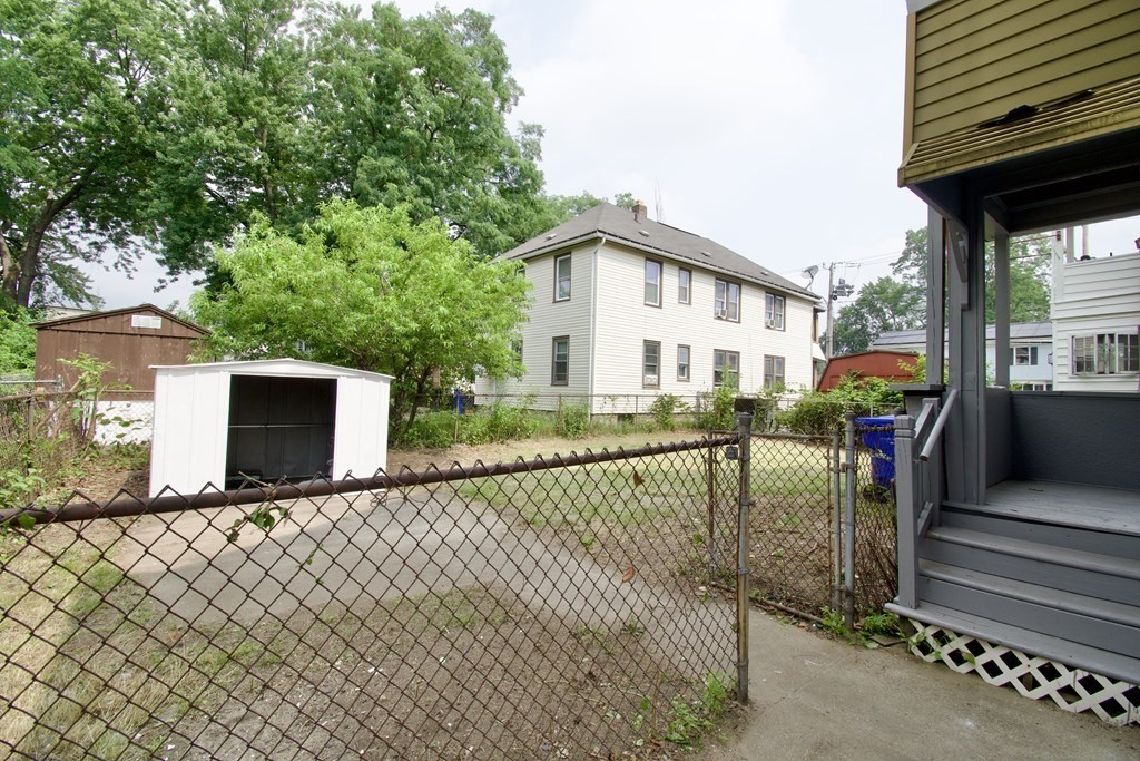 80-82 Silver Street Springfield, MA 01107 - Photo 5 of 31 a view of a house with backyard and sitting area