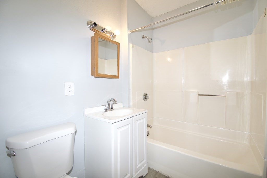 80-82 Silver Street Springfield, MA 01107 - Photo 10 of 31 a bathroom with a sink a toilet and shower