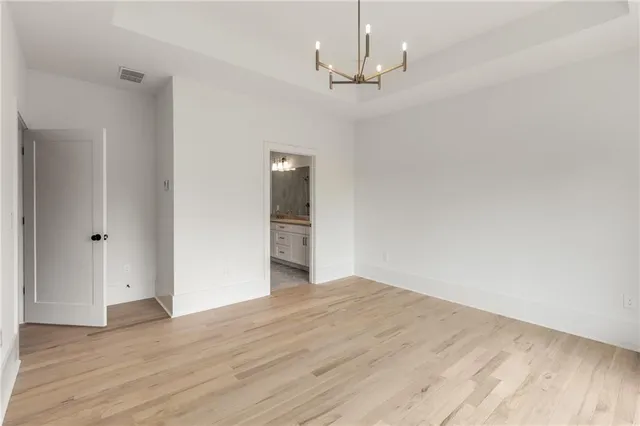 a bathroom with a toilet a sink and bathtub