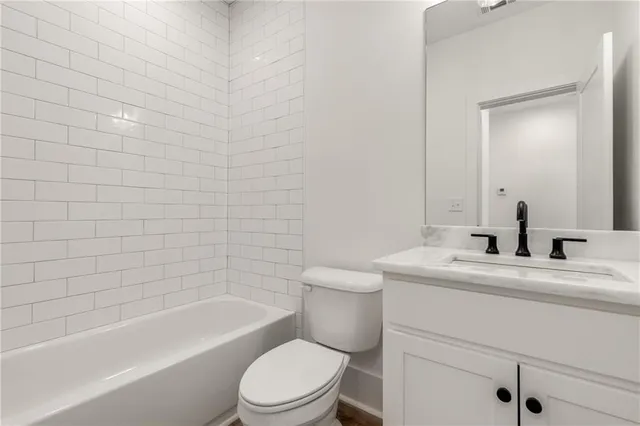 a view of a swimming pool with a seating space