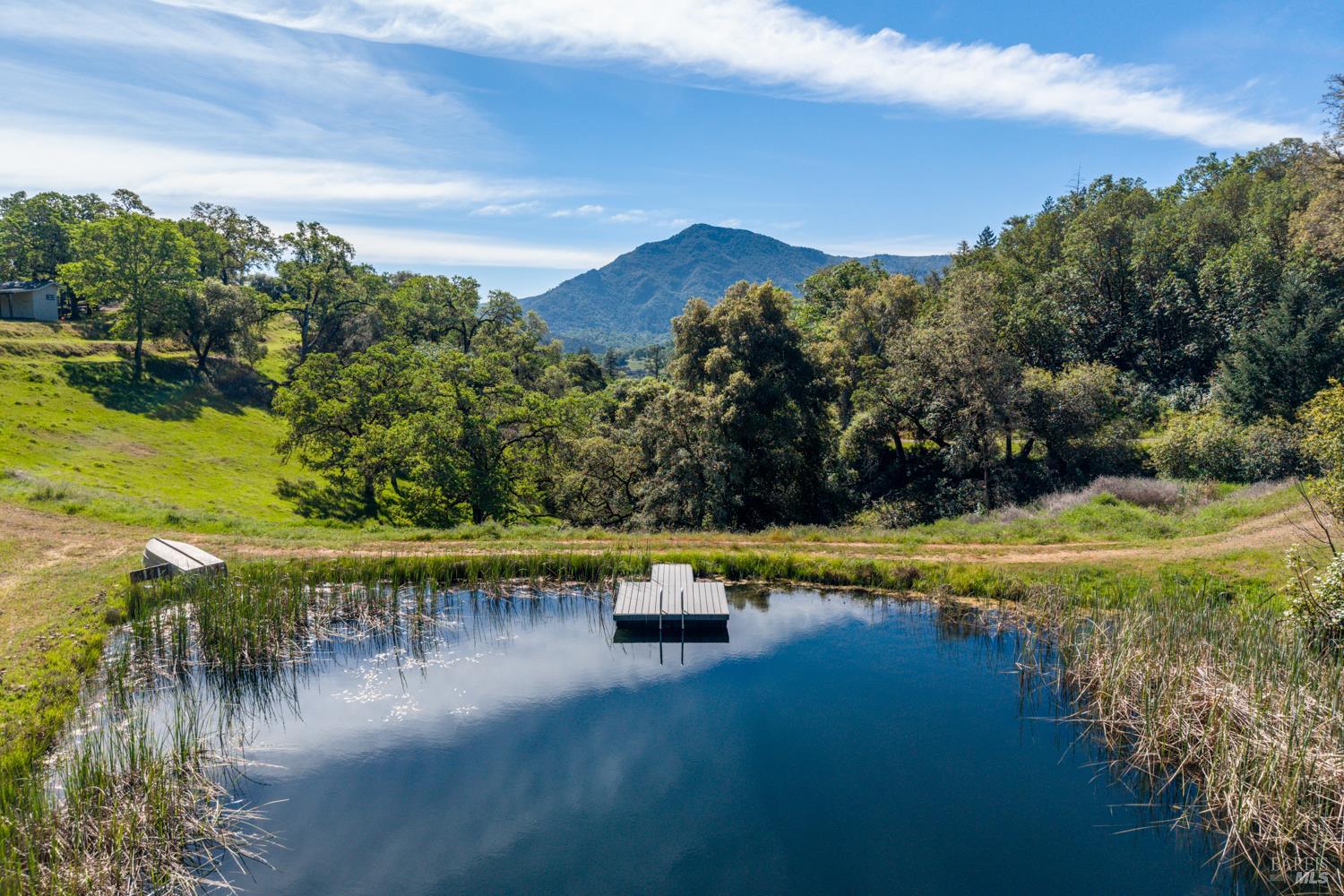 2800 Feliz Creek Road Hopland, CA 95449 - Photo 18 of 48 a view of a lake with a mountain