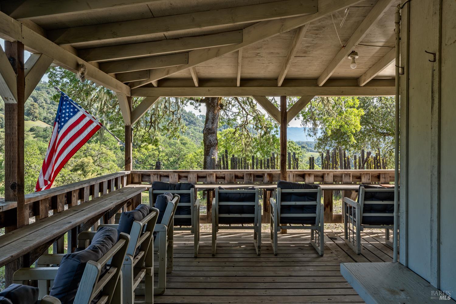 2800 Feliz Creek Road Hopland, CA 95449 - Photo 24 of 48 a view of a chairs and table in the balcony