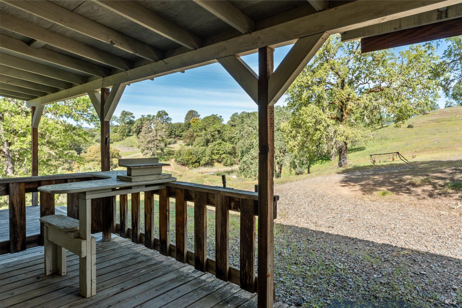 2800 Feliz Creek Road Hopland, CA 95449 - Photo 26 of 48 a view of a balcony with wooden floor