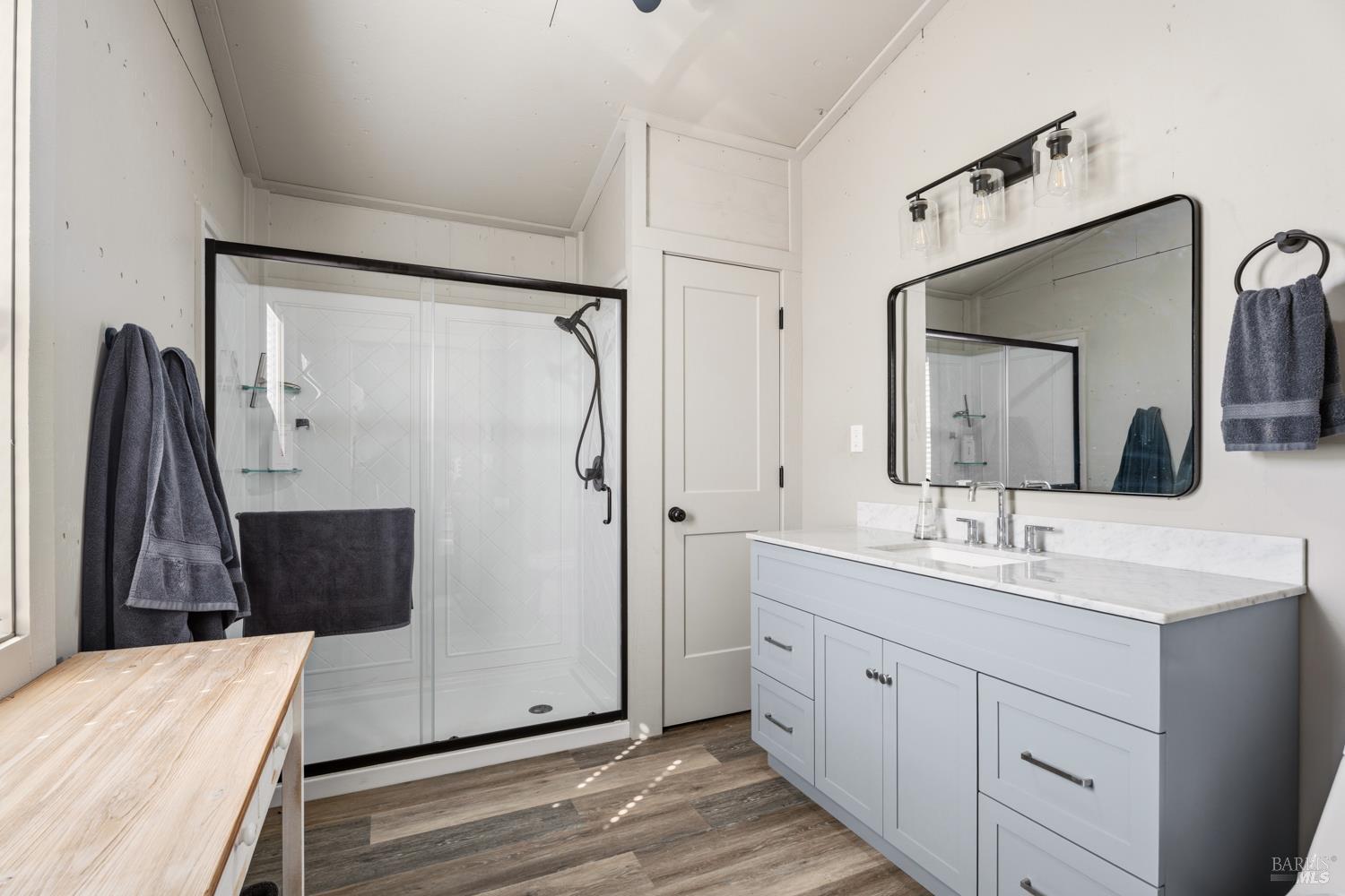 2800 Feliz Creek Road Hopland, CA 95449 - Photo 27 of 48 a bathroom with a double vanity sink mirror and shower